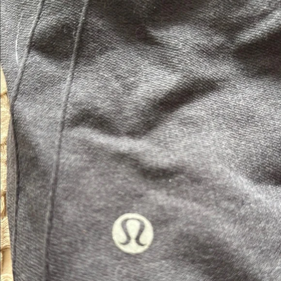 Two pair of Lululemon In The Flow- Cropped Gray and Black Leggings - Picture 2 of 4